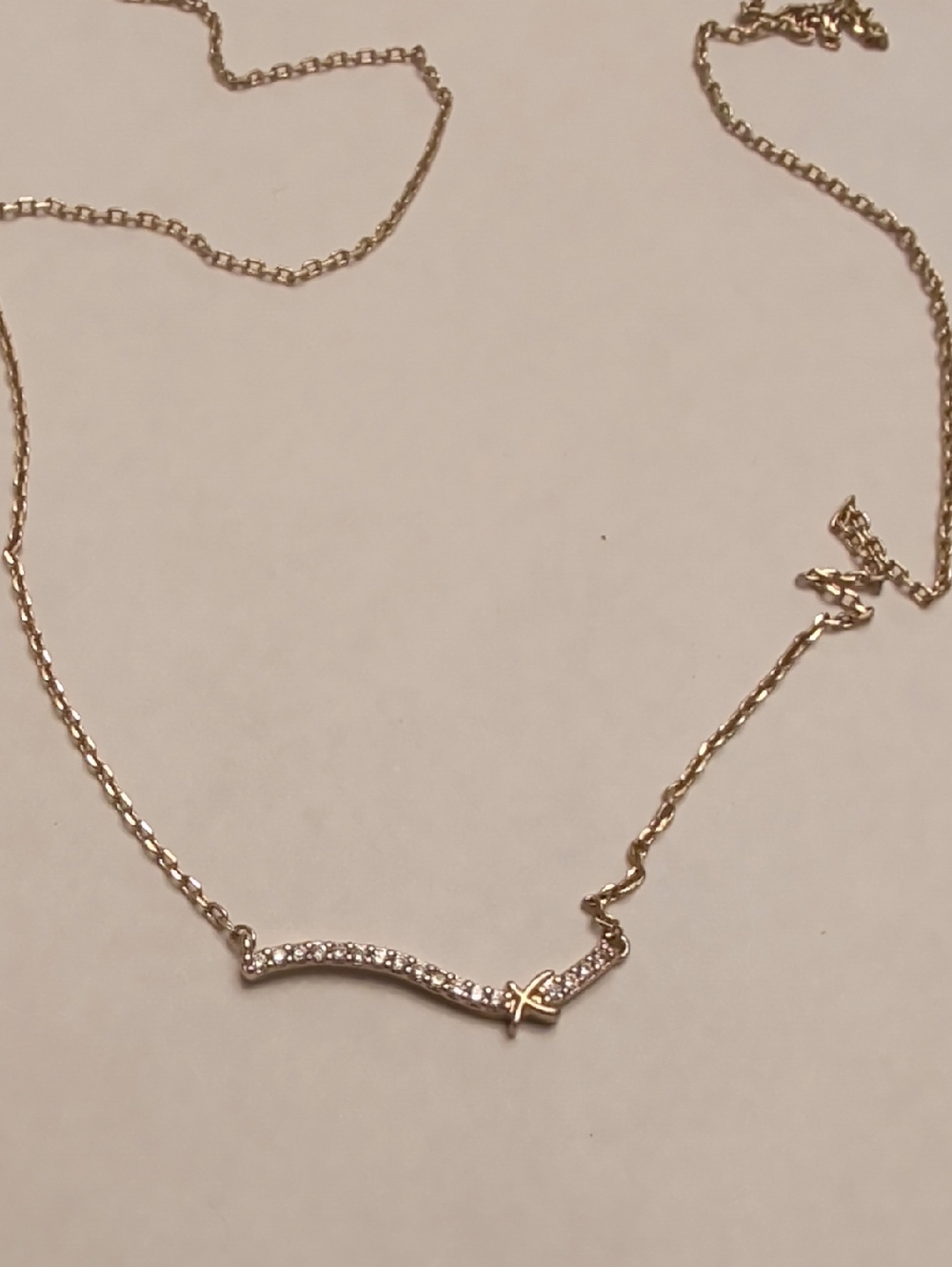 Delicate Gold Tone Bar Necklace with Crisscross Accent